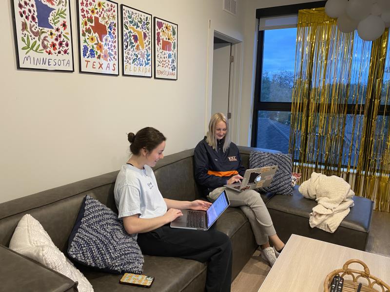 Two Girl Roommates on Hanging Out on the Couch and Doing Homework
